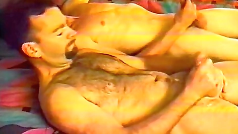 Sexy brunette hair shows her feet in the kitchen